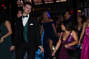 Students from Coppell High School’s class of 2019 dance at prom at AT&T Stadium in Arlington. The Sidekick business manager Nishant Medicharla discusses that even though this year’s prom has been canceled due to the coronavirus, the class of 2020 may have gained an invaluable lesson - learning to live in the moment.