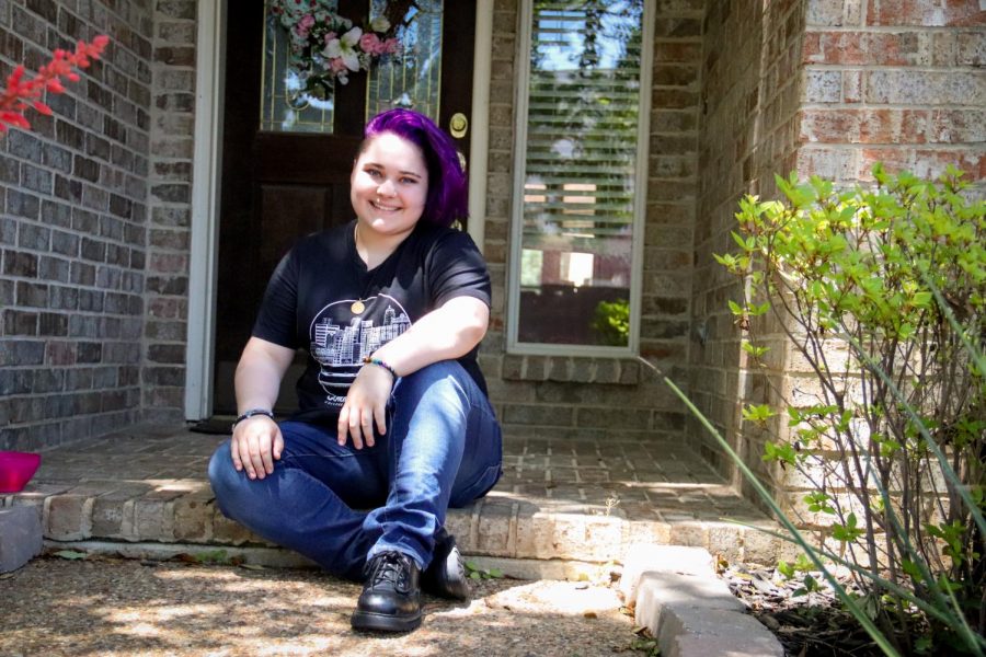 Coppell High school senior Ashlyn Peterman sits on her front porch wearing her college T-shirt. Peterman is pursuing a career in Technical Theatre at Columbia College Chicago. 