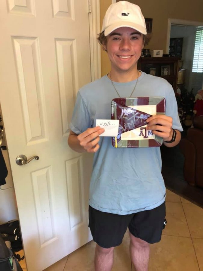 Coppell High School senior Justin Dodd receives his first gifts from the Adopt a Coppell High School Senior 2020 program. The program seeks to celebrate seniors living in Coppell by nominating students and sending them personalized gifts from adopters.