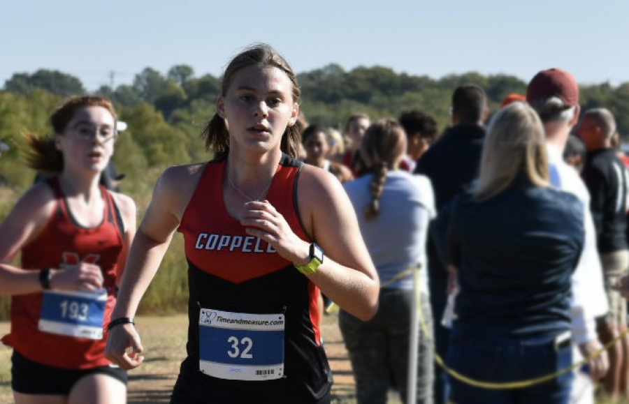 New Tech High @ Coppell senior Taylor Peltier finishes at the District 6-6A cross country meet on Oct. 18 at North Lake Park in Denton. Peltier committed to the State University of New York Environmental Science and Forestry (SUNY ESF) for cross country.