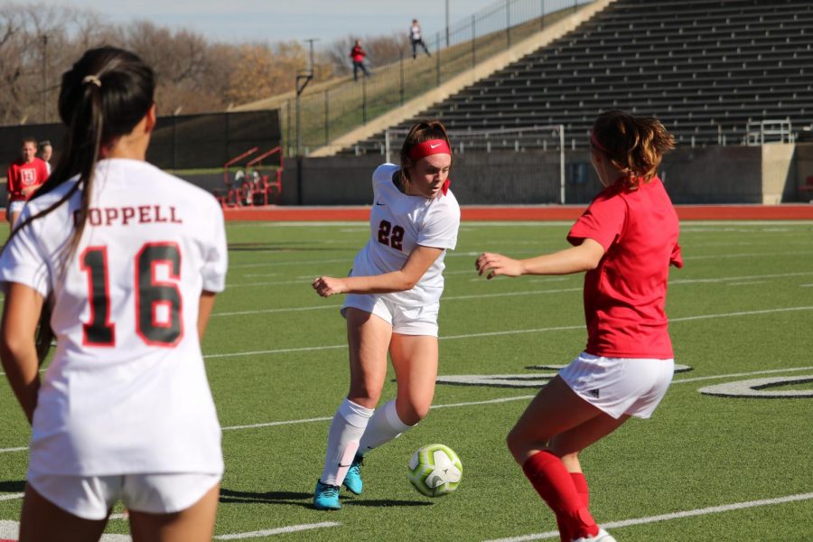 Former Coppell midfielder Maya Ozymy looks for an open teammate during the scrimmage against Belton on Saturday at Buddy Echols Field on Dec. 14, 2019. Ozymy now plays for Trinity University, where she overcame challenges en route to winning the Southern Collegiate Athletic Conference championship game with experience she gained at CHS.