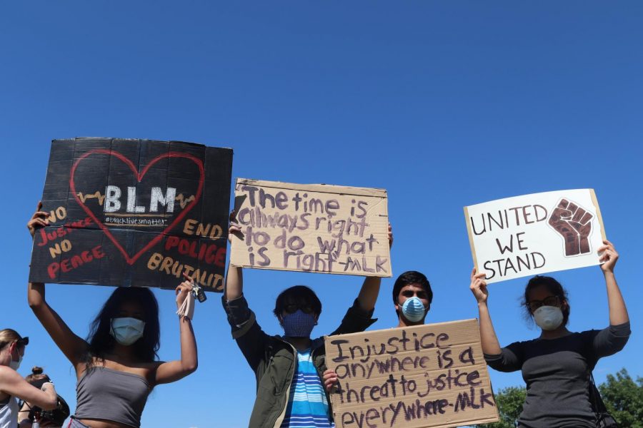 Coppell protesters stand against racism by supporting the Black Lives Matter movement behind City Hall on June 3. The Coppell community rallied together to spread awareness about BLM and fighting racial injustice.