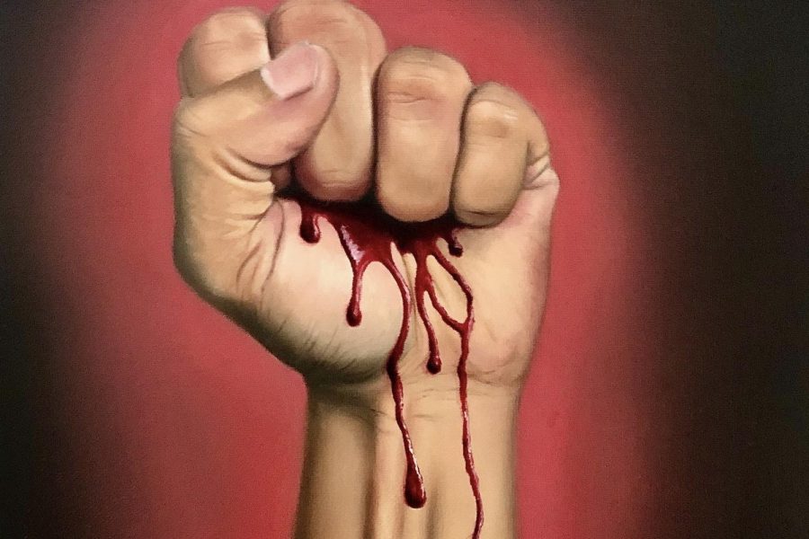 Following the death of George Floyd, Coppell High School senior Ishita Sisodia finishes an oil painting on June 5 in solidarity with the Black Lives Matter movement. Local artists have put their talents to use by raising awareness and money for the movement through donation commissions and artwork. 