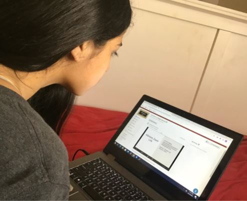 CHS9 student Manaswee Upreti opens her advisory course on Schoology to see the agenda for this week. CHS9 has recently implemented a new program, “Family Friday,” in addition to their standard study hall that allows students to develop professional and personal skills. 