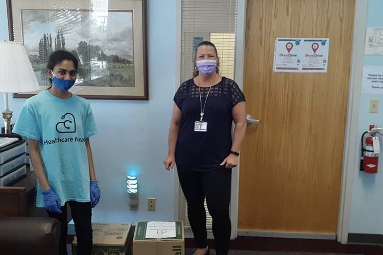 Coppell High School senior Naisha Gottipati delivers a donation of face shields to UT Southwestern Clements Jr. University Hospital on July 14. Gottipati started the nonprofit Healthcare Meals, Inc. to raise money, food, and personal protective equipment for hospitals in the Dallas-Fort Worth area.