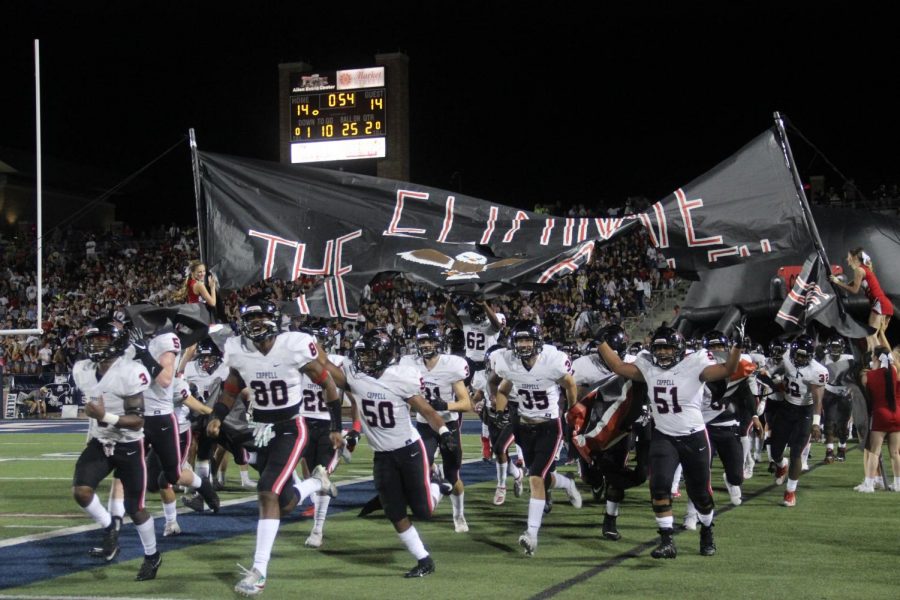 The+Coppell+football+team+runs+out+after+halftime+against+Allen+on+Sept.+13%2C+2019.+The+Cowboys+face+Mesquite+tomorrow+at+7%3A30+p.m.+at+E.H.+Hanby+Stadium+for+their+first+game+of+the+season.