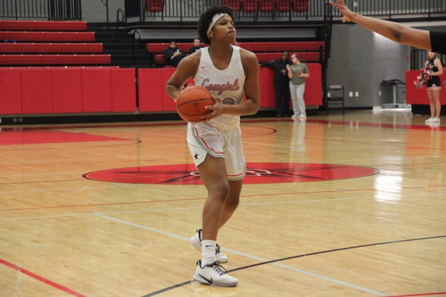Coppell senior forward India Howard passes against Irving MacArthur on Jan. 21 in the CHS Arena. Howard is one of many students speaking out on social media in support of the NBA strike.