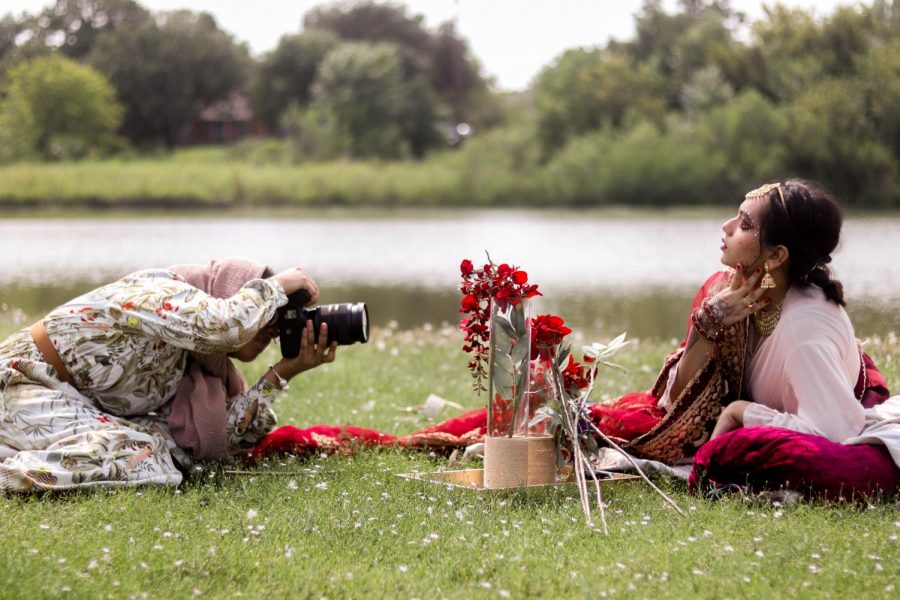Coppell High School senior Yusra Mohammed photographs CHS senior Nausheen Ahmed at Moore Road Park. Mohammed’s photography is centered around cultural fashion in order to highlight the beauty of individuality. 