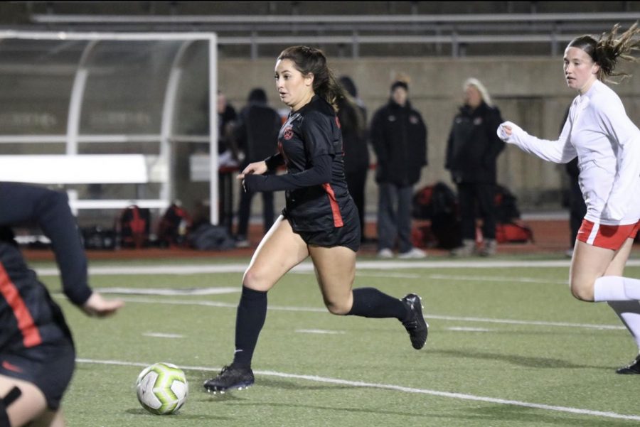 Former Coppell defensive midfielder and  CHS 2020 graduate Montse Lomeli races down Buddy Echols Field on Feb. 10 against Marcus last season. Lomeli is attending Northumbria University this fall  in Newcastle, England, and plans to major in sports management while playing soccer. Sidekick file photo. 