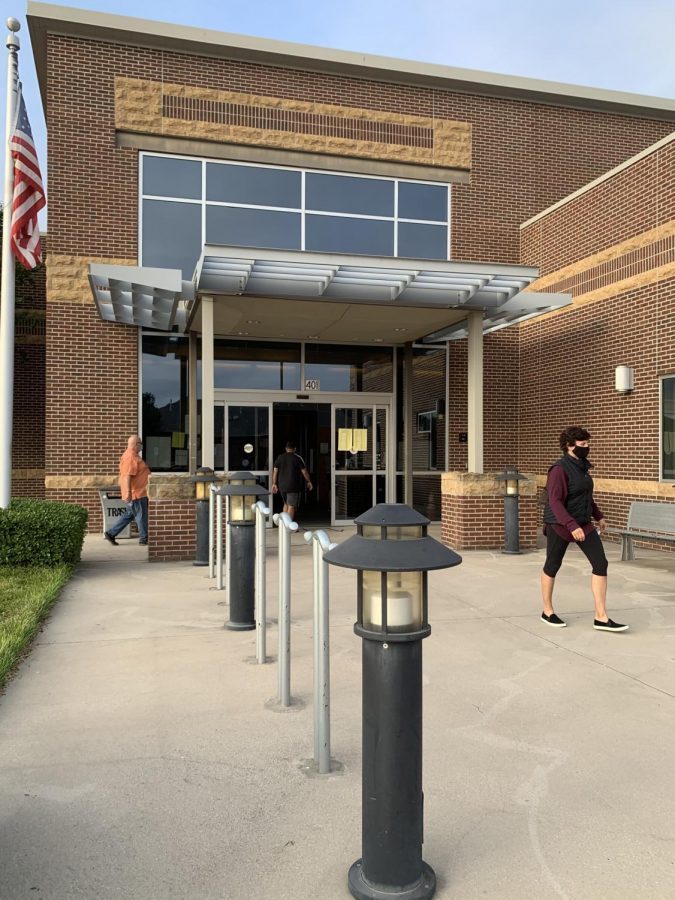 Irving residents walk into Valley Ranch Public Library for early voting on Oct. 19. Valley Ranch Public Library is one of the six locations in Irving that holds early voting during COVID-19.