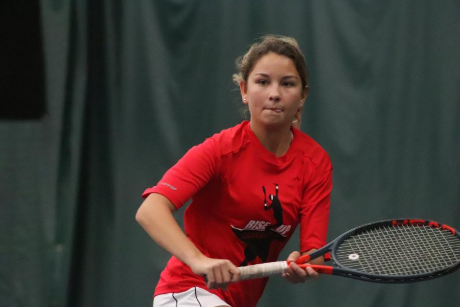 Coppell sophomore Lindsay Patton hustles across the court during a point against Prosper on Monday at T Bar M Racquet Club in Dallas. Coppell won, 10-2, clinching the Class 6A Region I bi-district title and advancing to defeat Lake Highlands, 10-0, in today’s area playoffs.