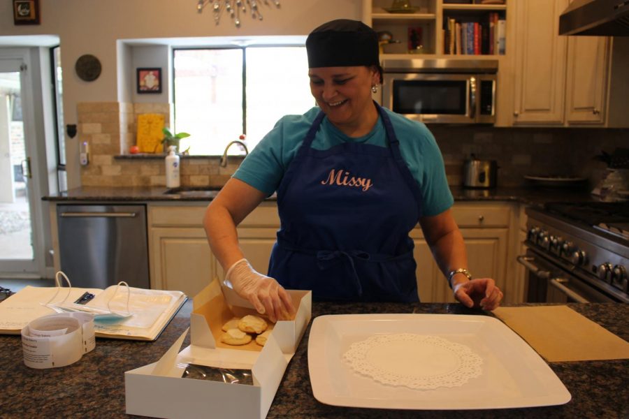 Coppell parent and Missy’s Cottage Bakery owner Michelle Zenici packages cookies at her house on Oct. 24. Zenici established Missy’s Cottage Bakery on July 3 after a change in the Texas Cottage Food Law that allows bakers to produce and sell goods from home. (Precious Onalaja)