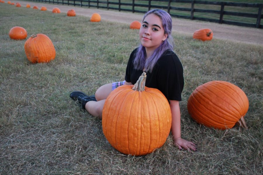 The Sidekick executive editorial page editor Camila Villarreal enjoys the fall season at the Flower Mound Pumpkin Patch on Monday. Due to COVID-19, fall has felt gloomy, but Villarreal emphasizes the importance of keeping the fall spirit alive.