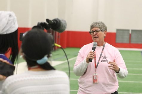 Coppell High School Principal Laura Springer introduces the 2020 virtual homecoming pep rally in the Coppell indoor  facility on Wednesday. The annual Homecoming pep rally was moved online due to COVID-19, and is available to watch today.