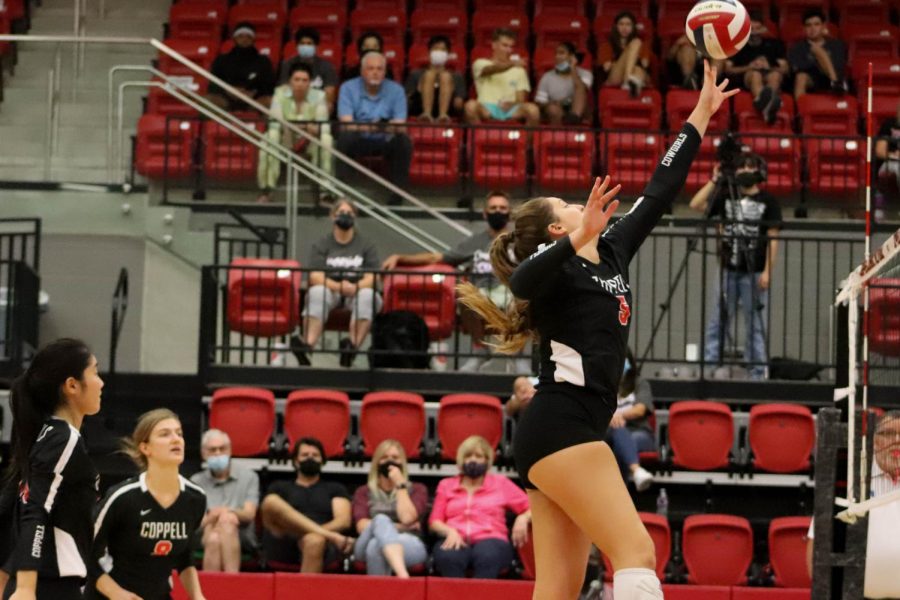 Coppell+senior+middle+hitter+Madison+Gilliland+spikes+against+Hebron+on+Oct.+9+at+the+CHS+Arena.+Coppell+returns+to+district+play+after+a+two-week+quarantine+to+face+Marcus+at+6%3A30+p.m.+tomorrow+night+at+the+CHS+Arena.