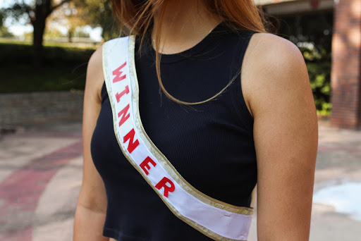 Coppell High School senior Michelle Tack wears a crown and sash, representing how East Asians in America are often used as a “model minority” to demean other people of color. The Sidekick staff writer Joanne Kim shares her opinion on how the model minority stereotype can put Asian Americans in a place of privilege, and what they can do to support other minority groups. 