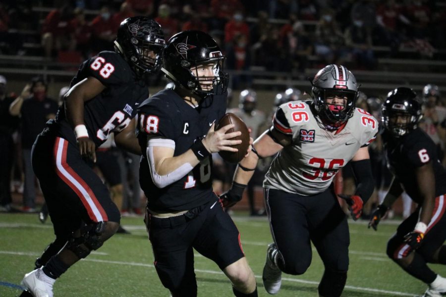 Coppell senior quarterback Ryan Walker looks for an open teammate against Flower Mound Marcus on Friday at Buddy Echols Field. The Cowboys lost to the Marauders, 38-24.