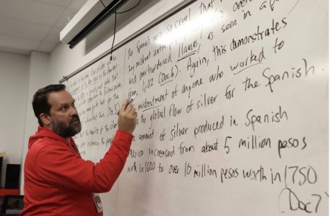 Coppell High School AP world history teacher Shawn Hudson goes over document-based question writing with his class on Zoom on Friday. Hudson was selected as The Sidekick Teacher the Issue for December. Photo by Lilly Gorman