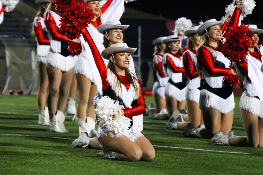 Coppell junior Lariette Mariana Lozano performs during halftime on Friday at Buddy Echols Field. With a 51-28 win over the Jaguars, the Cowboys face Denton Guyer on Saturday at 1 p.m. at C.H. Collins Complex in Denton in the Class 6A Region I bi-district playoffs. 