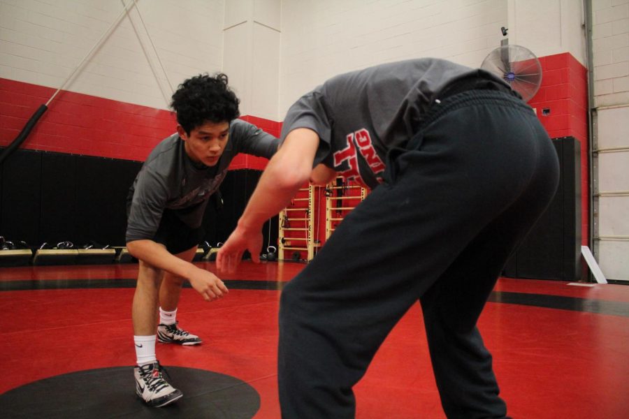 Coppell senior Jo’el Hernandez practices sparring with sophomore Dominic Godinez
on Friday in the CHS Field House. Hernandez is the captain of the wrestling team and is also a member of the Technology Student Association, an organization dedicated to business education and STEM.