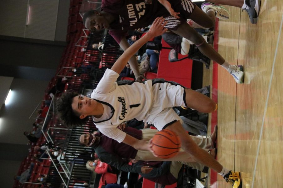 Coppell junior guard Anthony Black drives against Plano West at the CHS Arena on Jan. 15. Black was named All-District 6-6A Most Valuable Player.