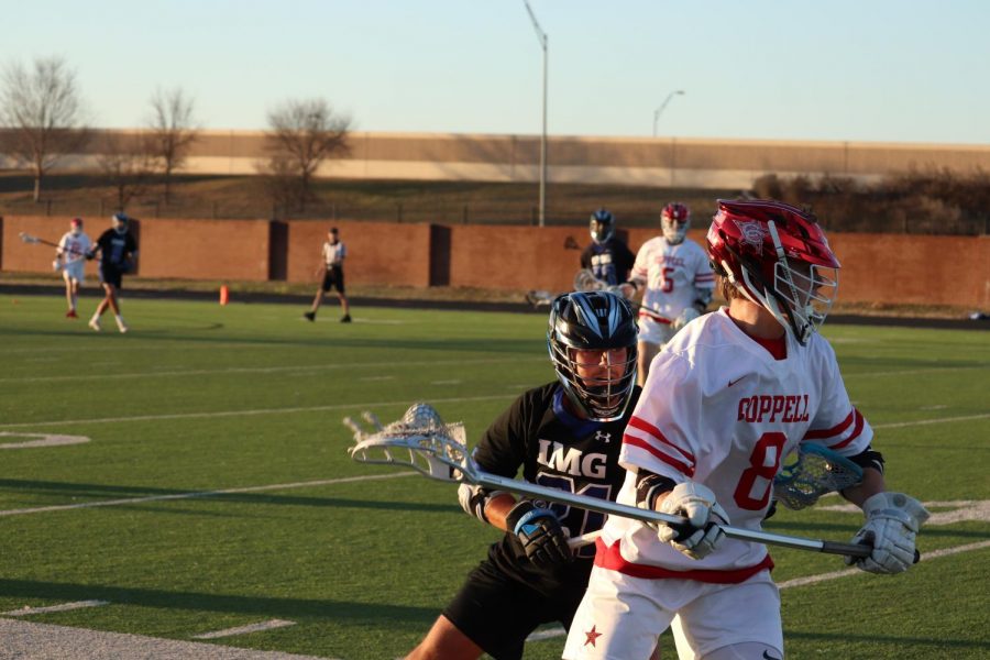 Coppell+senior+long-stick+midfielder+guards+against+IMG+National+at+Coppell+Middle+School+North+on+Feb+24.+Coppell+faces+its+rival+Southlake+Carroll++at+Lesley+Field+on+Thursday+at+7%3A30+p.m.