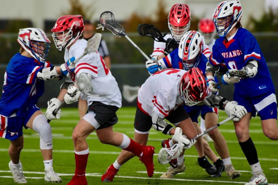 The Cowboys scramble for possession against Grapevine on Sunday afternoon at Lesley Field. Coppell hosts Allen tomorrow at 8 p.m. at Lesley Field. 