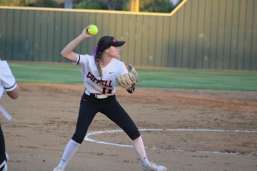 Coppell senior third baseman Reagan Stange throws to first base against Flower Mound on Friday at the Coppell ISD Baseball/Softball Complex. The Cowgirls lost to the Jaguars, 4-0.