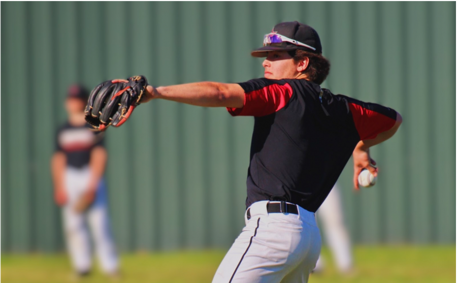 Coppell senior infielder/pitcher Sam Rodman pitches at practice on March 3 at the Coppell ISD Baseball/Softball Complex. The Cowboys host Plano West tonight, with first pitch at 7:30 p.m. 