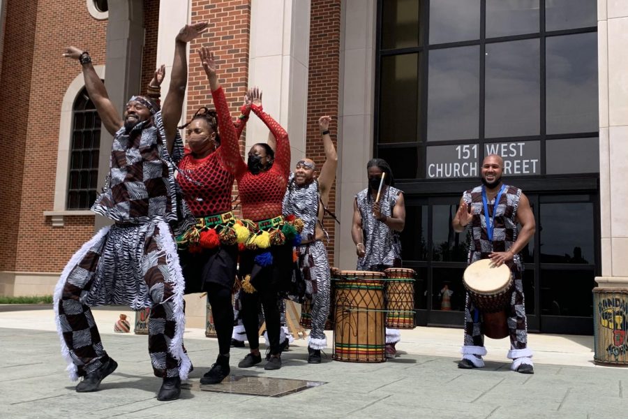The Bandan Koro African Drum & Dance Ensemble performs at Lewisville City Hall on Saturday at ColorPalooza. The event celebrated spring with art demonstrations, food trucks, local vendors, musical performances and interactive experiences.