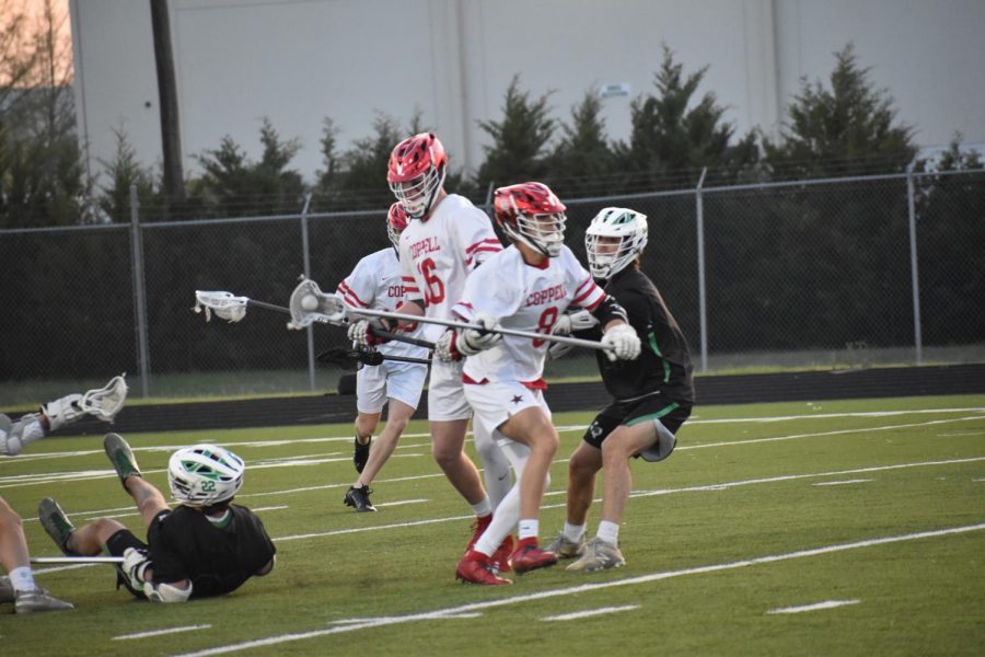 Coppell senior long-stick midfielder Canon Peters fast-breaks against Southlake Carroll at Lesley Field on Thursday. Coppell lost to Carroll, 10-9.