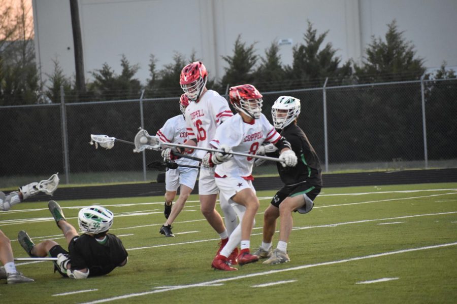 Coppell+senior+long-stick+midfielder+Canon+Peters+fast-breaks+against+Southlake+Carroll+at+Lesley+Field+on+Thursday.+Coppell+lost+to+Carroll%2C+10-9.