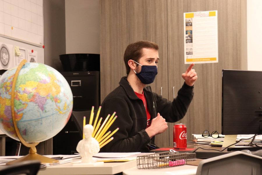 AP World History teacher Connor Blake lectures to his class during seventh period on Jan. 15. Blake was selected as Teacher of the Week for the 2020-21 school year.