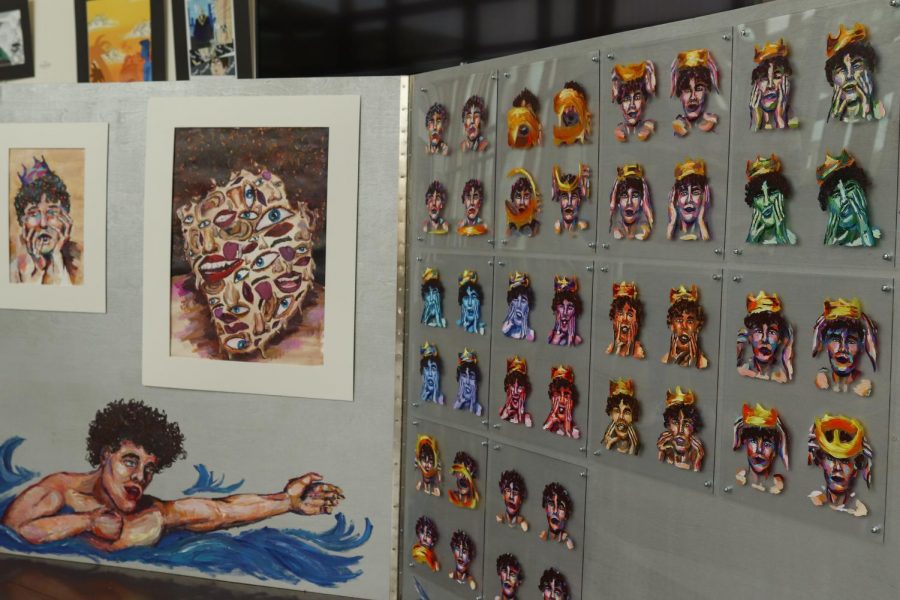 Coppell High School AP drawing senior Marty Hightower explorers narcissism and self identity through a series of paintings displayed at the Coppell Arts Center on Saturday.  AP Drawing, AP 3D Design and AP 2D Design students had their art show at the Coppell Arts Center from March 25-April 11.