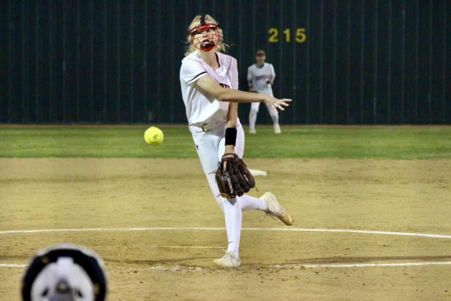 Coppell junior Katherine Miller pitches against Hebron on Wednesday at the Coppell ISD Baseball/Softball Complex. The Cowgirls defeated Hebron, 8-5. 