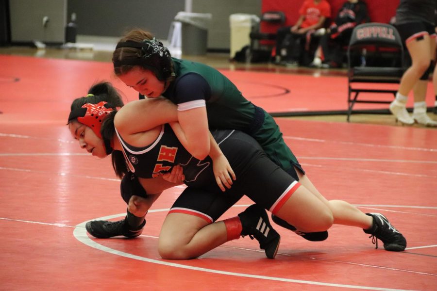 Coppell senior Hannah Francis competes in Coppell’s annual Santa Slam Meet at the CHS Arena. The Coppell girls wrestling team took home the District 6-6A title on Saturday at Allen High School with a total score of 111.