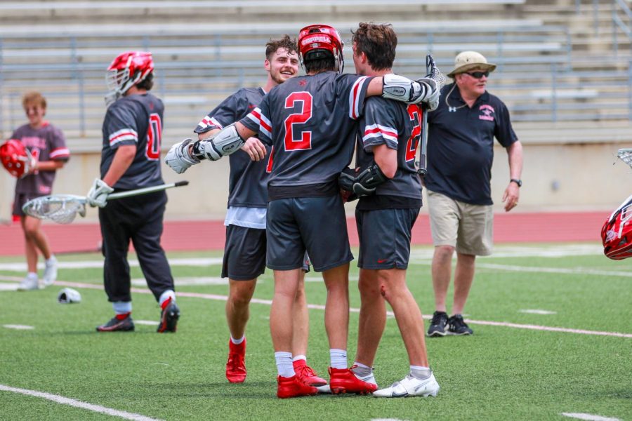 Coppell senior midfielders Bain Carter, Tyler Wendel and Jacob Dashner embrace after fulltime is called in the 2021 THSLL State Championship on Sunday at George Turner Stadium in Humble. Coppell became the THSLL Class A State Champions after defeating Dallas St. Mark’s, 10-8, and Vandergrift, 5-4, in the Class A State Championships on Saturday, at Kingwood High School, and Sunday, at George Turner Stadium. 