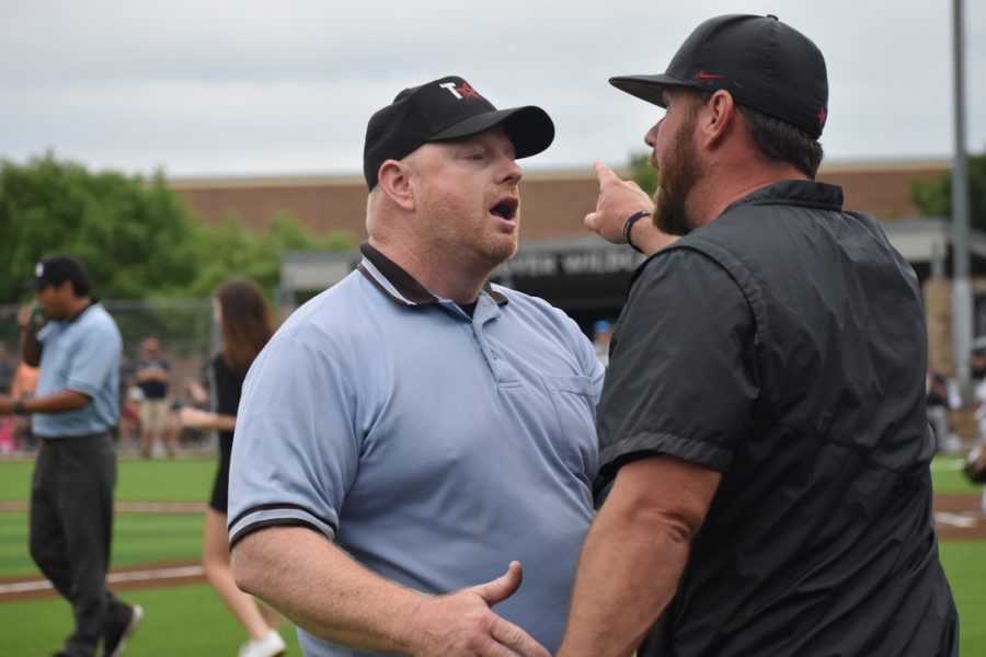 Coppell coach Ryan Howard argues with the third base umpire about a called strikeout that ended the fifth inning while the Cowboys had bases loaded on Friday at Denton Guyer. The Cowboys lost the decisive Game 3 on Saturday, 7-1, and ended their season as Class 6A Region I semifinalists after losing Game 1 on Thursday, 5-2, and winning Game 2 on Friday, 6-5.