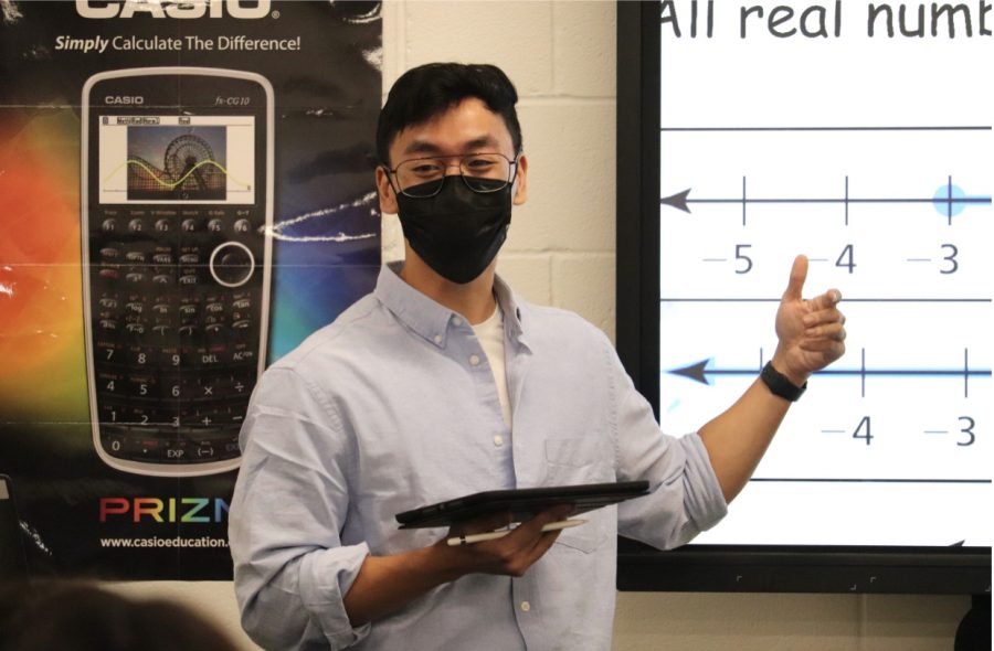 Coppell High School algebra II teacher Alec Nguyen Bui introduces characteristics of functions to his fourth period class on Monday. Bui is a new teacher at CHS and he graduated from the University of North Texas in December. 