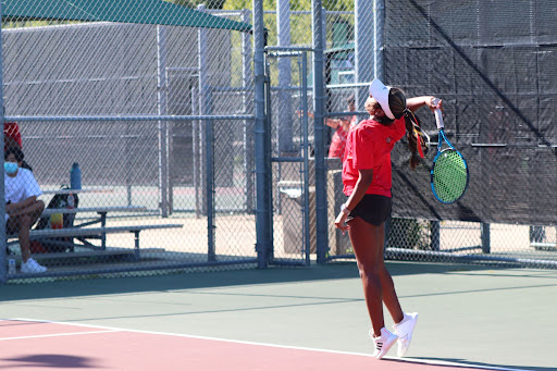 Coppell junior Lakshana Parasuraman serves against Plano during a doubles girls match on Tuesday. The Coppell tennis team defeated Plano, 17-2. 