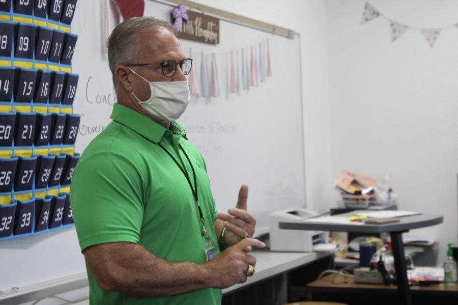 Coppell High School AP U.S. government substitute teacher Thomas Sills instructs his seventh period class on Sept. 15. Sills coached girls basketball and track for 16 years at Coppell ISD and is now a substitute after retiring from teaching. 