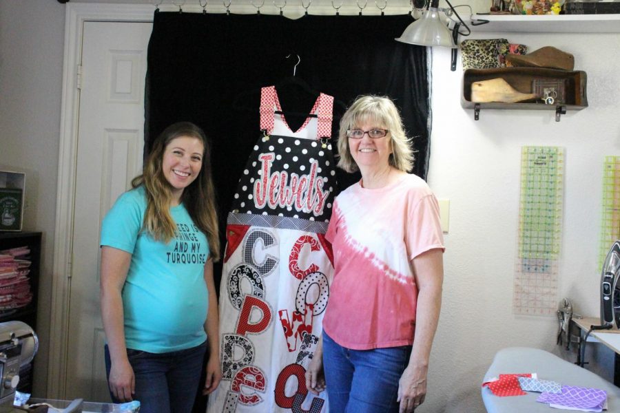 Jewels N Cotton founder Julie Urbach and sales and marketing manager Jennifer Ham sell senior overalls for Coppell High School students. Urbach and Ham are a daughter and mother duo who have been in business since 2009.