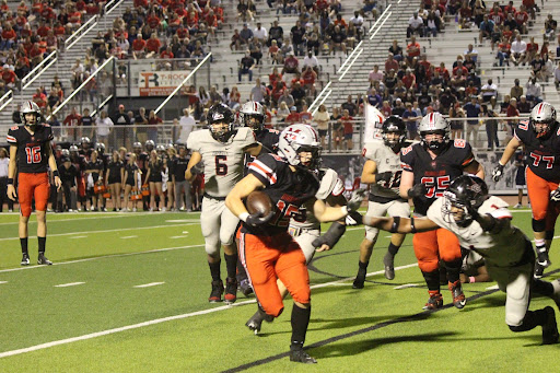 Coppell junior linebacker Ike Odimegwu lunges for Marcus senior running back Gabe Espinoza at Marauder Stadium on Oct. 8. The Cowboys host Hebron at Buddy Echols Field on Friday at 7 p.m.