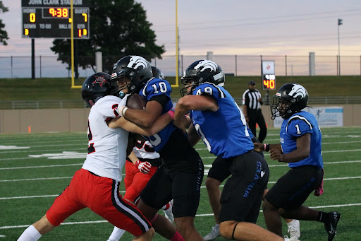 Coppell senior defensive back Miles Hardy tackles Plano West senior wide receiver Cristian Baul at John Clark Stadium on Oct.1. The Cowboys travel to Marauder Stadium to play Marcus tomorrow at 7 p.m.