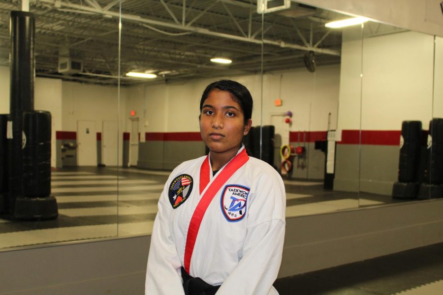 The Sidekick communications manager Varshitha Korrapolu wears her dobok, at Valley Ranch Taekwondo on Monday. Korrapolu expresses gratitude for taekwondo and how it has made her the person she is today.
