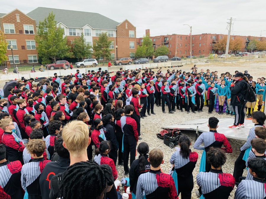 Coppell High School head band director Kim Shuttlesworth delivers a speech to the band program before the Bands of America competition in St. Louis. Band placed third in the competition, making history with Coppell’s highest rank and highest score. 
