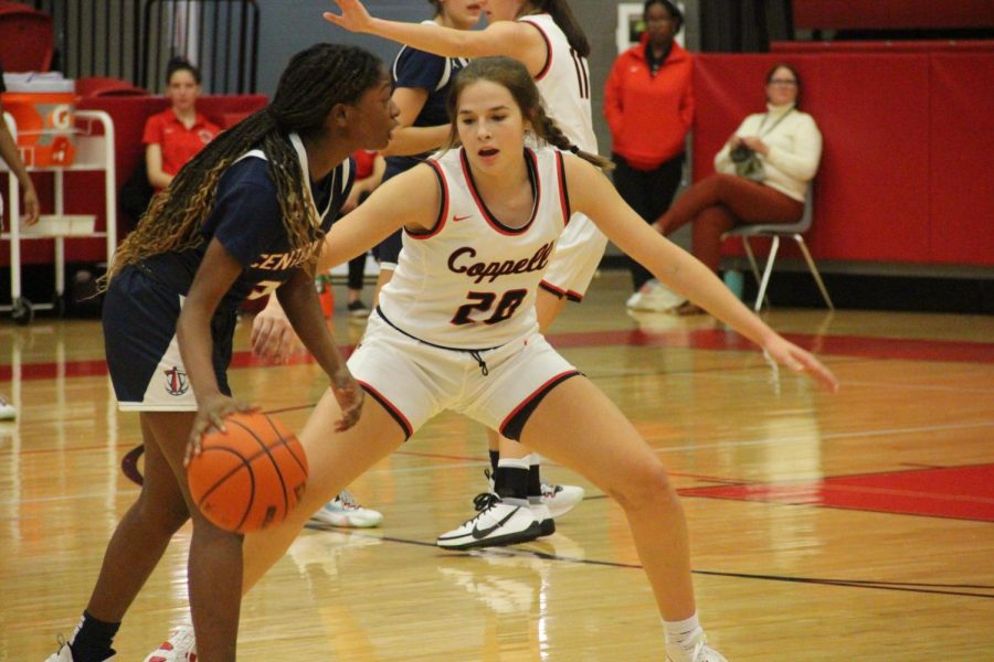 Coppell junior guard Jules Lamendola defends against Frisco Centennial at the CHS Arena on Nov. 5. The Cowgirls play Highland Park at the Coppell Large Gym at 5:30 p.m. on Friday. 