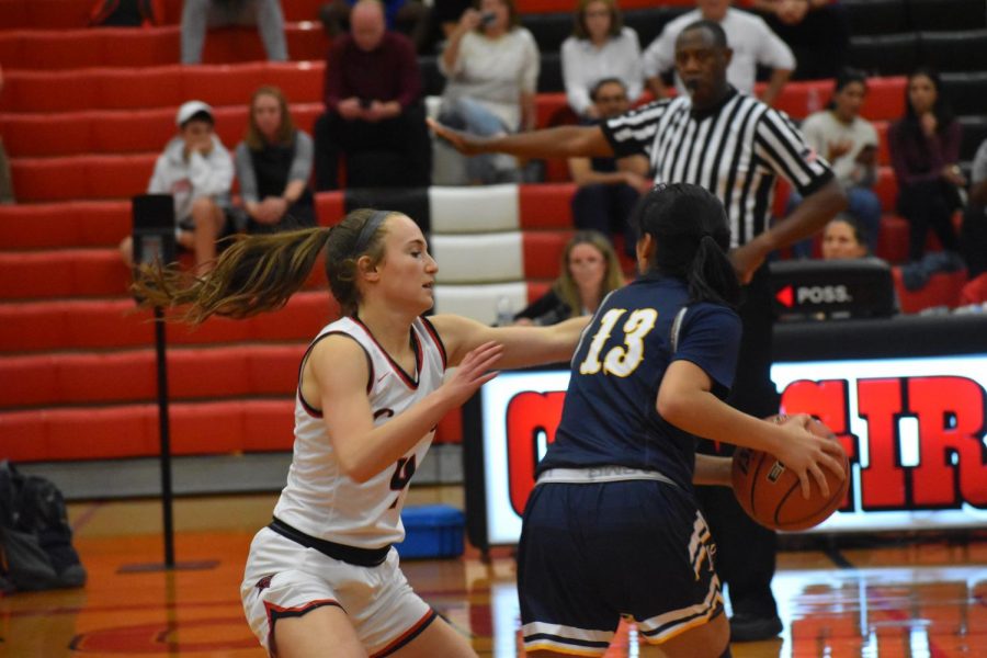 Coppell junior guard Allyssa Potter defends against Highland Park at the Coppell High School Large Gym on Nov. 12. The Cowgirls play Edgewood at the CHS Arena tomorrow at 6:30 p.m.