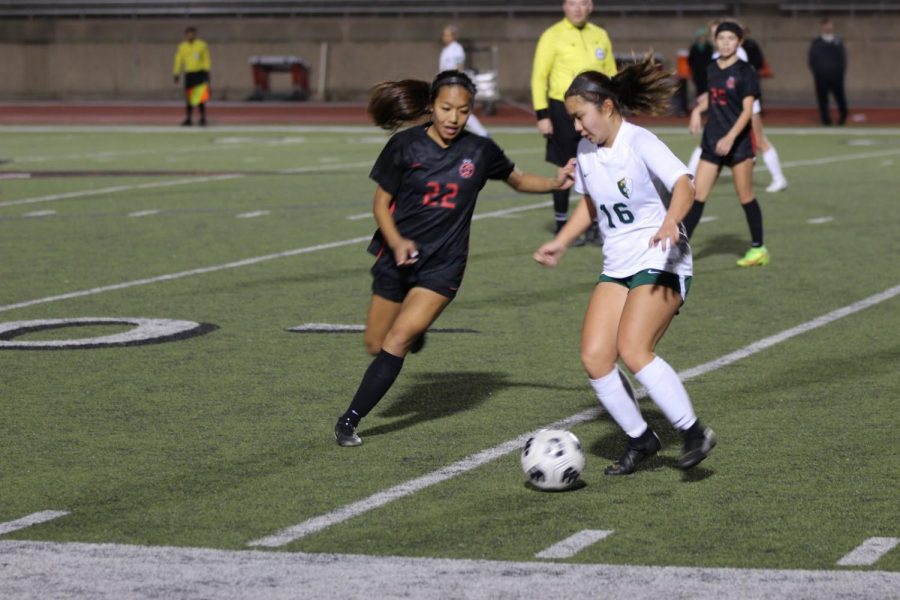 Coppell freshman defender Summer Chen passes down field with minutes left in the second half against Frisco Lebanon Trail. Monday’s match at Buddy Echols Field was the first scrimmage for the Cowgirls, with the Cowgirls winning 5-0.