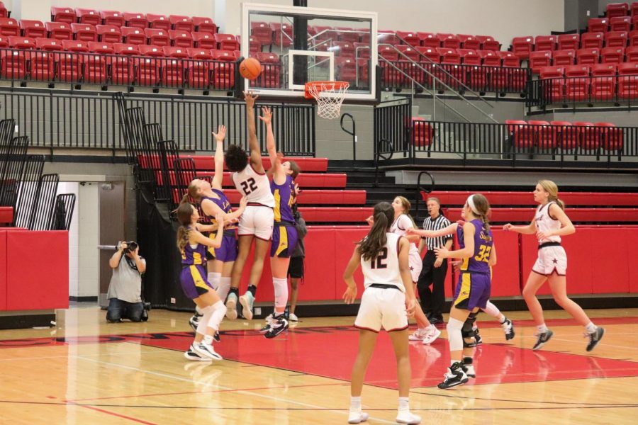 Coppell ​​senior forward India Howard shoots against Sanger in CHS Arena on Tuesday. The Cowgirls defeated Sanger, 50-31.